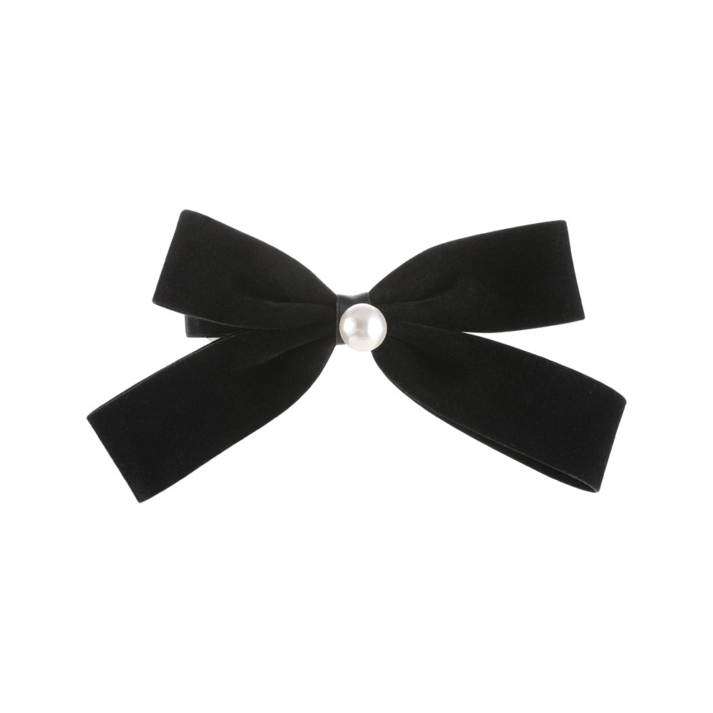 A French retro black velvet pearl bow with a hair clip at the back of the head