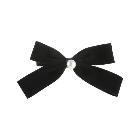 A French retro black velvet pearl bow with a hair clip at the back of the head