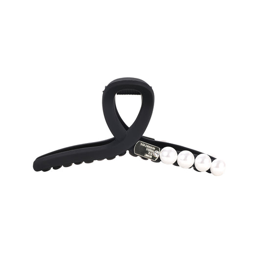 A sophisticated matte pearl hairpin with a high-end feel and a shark clip