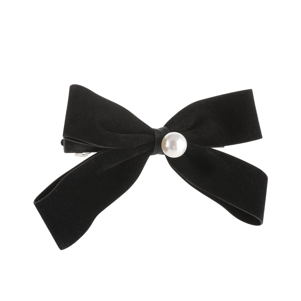 A French retro black velvet pearl bow with a hair clip at the back of the head