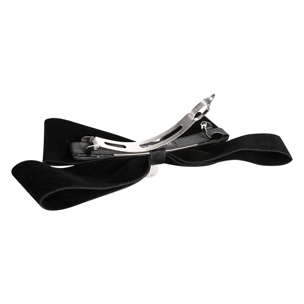 A French retro black velvet pearl bow with a hair clip at the back of the head