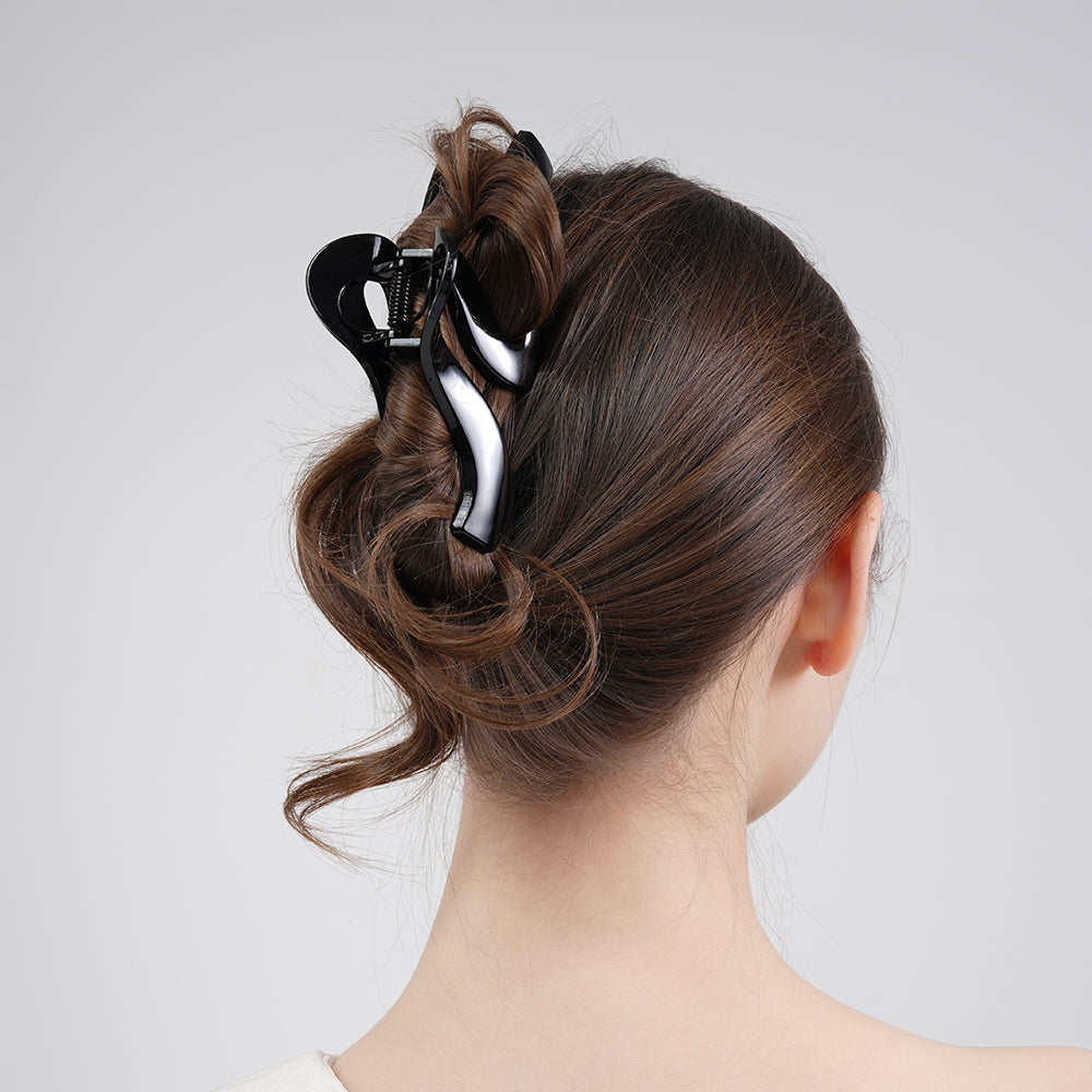 Wavy large-sized grab clip with coiled hair at the back of the head shark clip