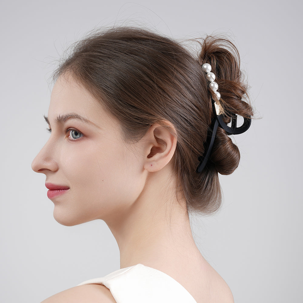 A sophisticated matte pearl hairpin with a high-end feel and a shark clip