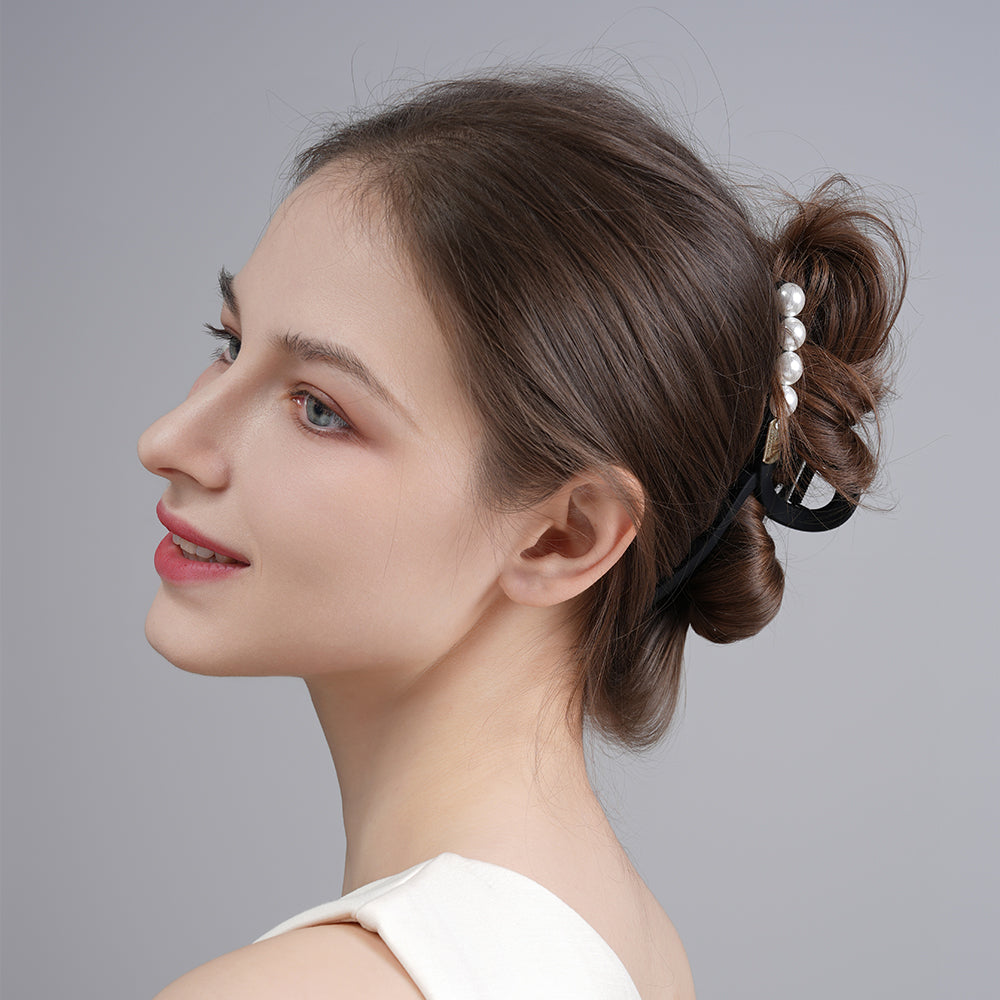 A sophisticated matte pearl hairpin with a high-end feel and a shark clip